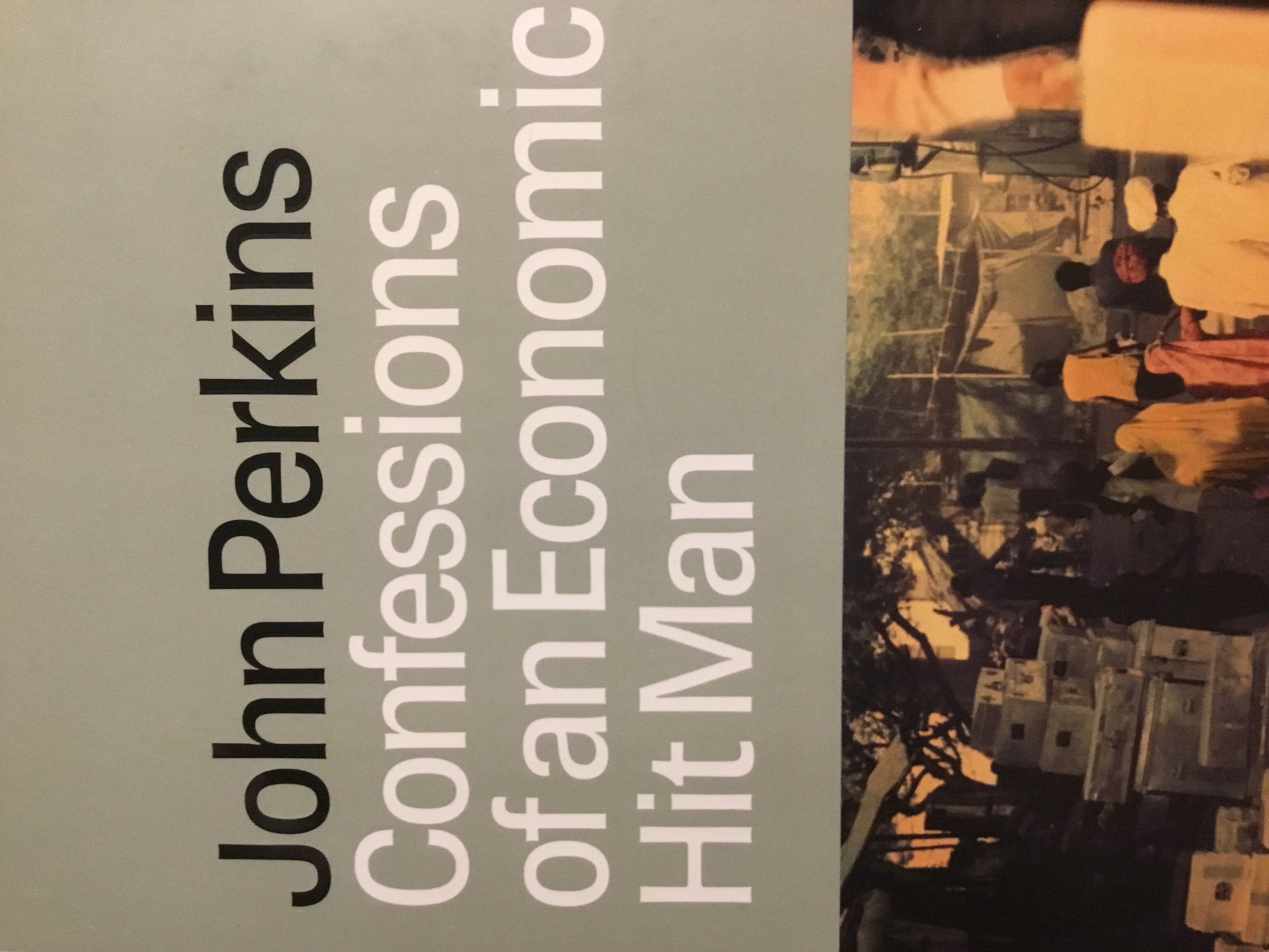 Cover of Confessions of an Economic Hit Man Book Summary